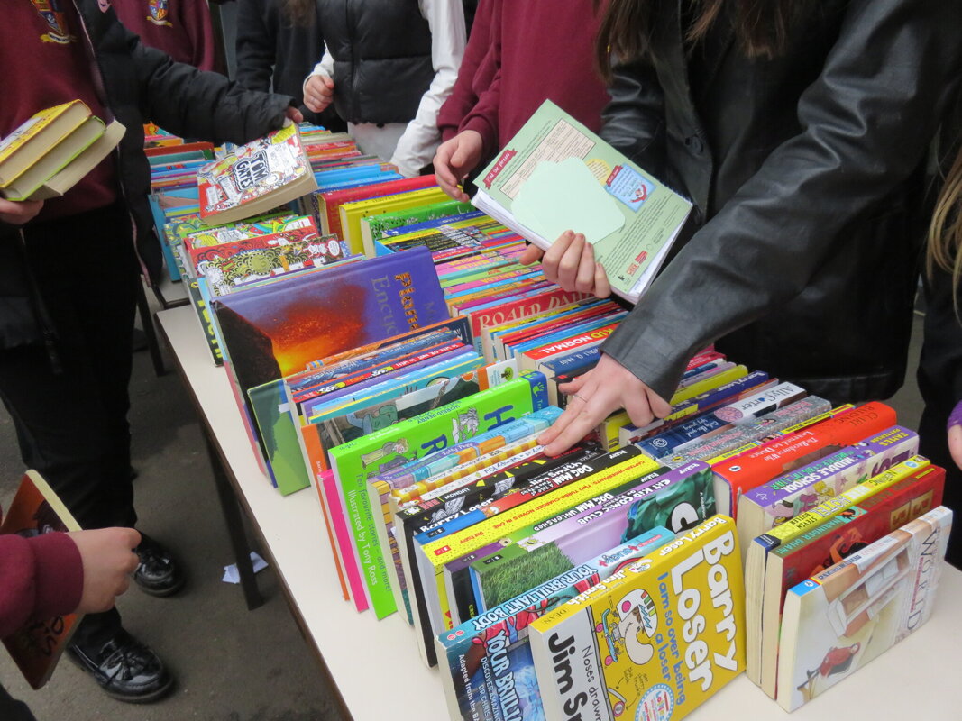 Image of Book Swap enjoyment on World Book Day